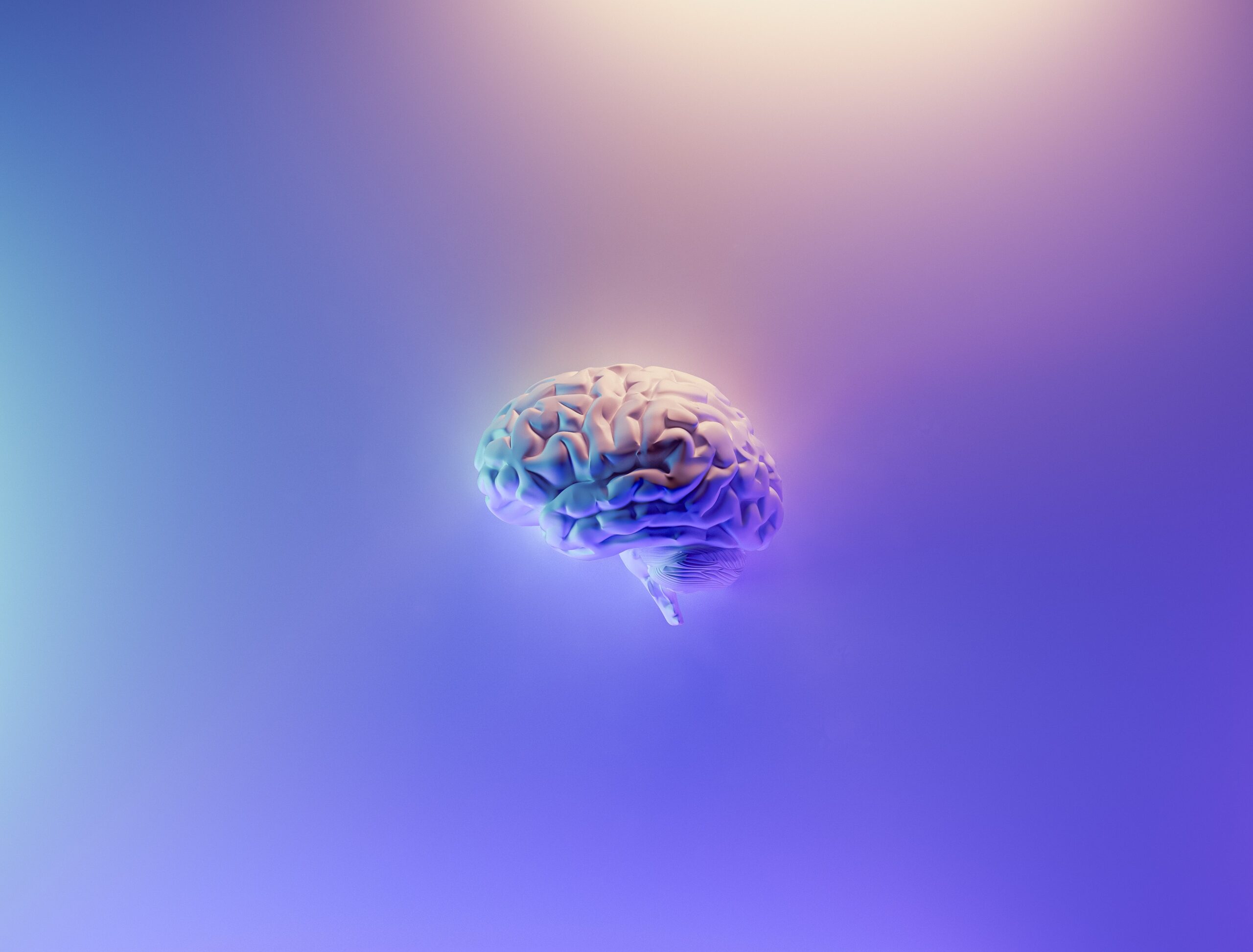 a glowing brain with purple, blue, and white lights